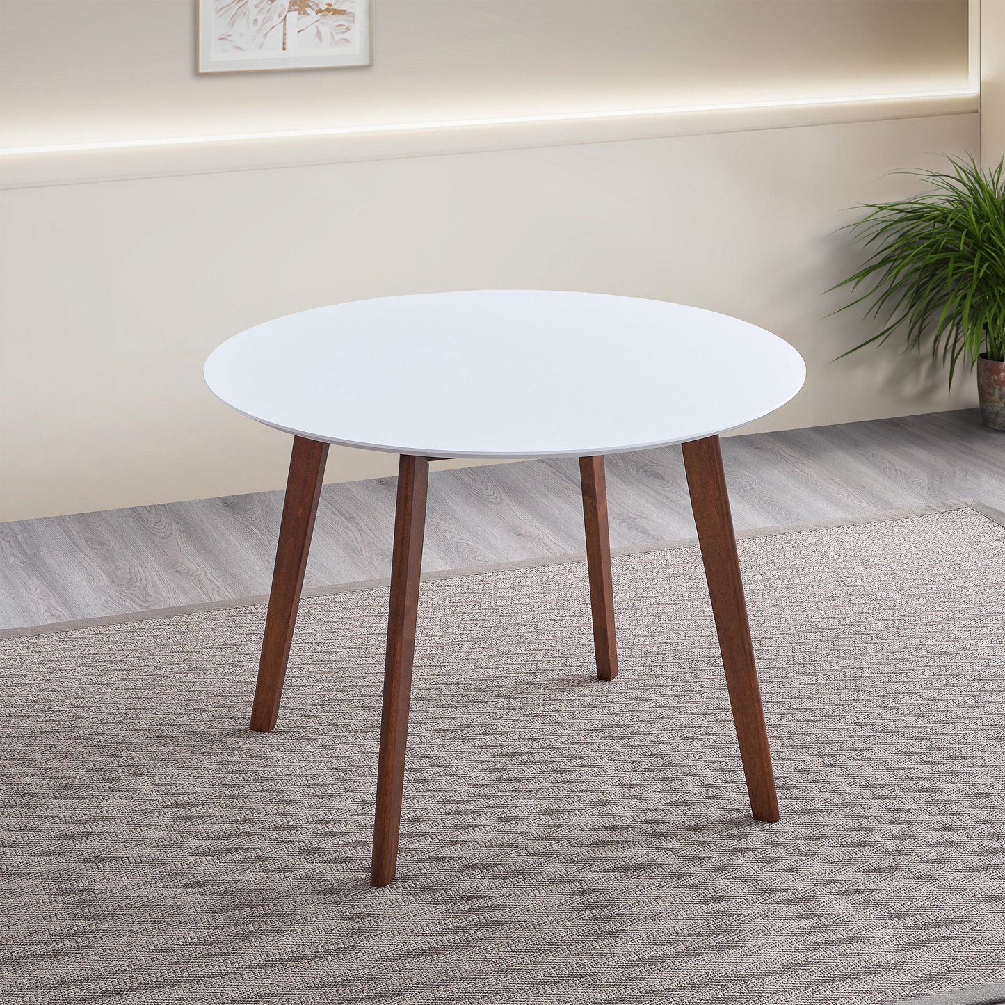 White round dining table with wooden legs perfect for small spaces