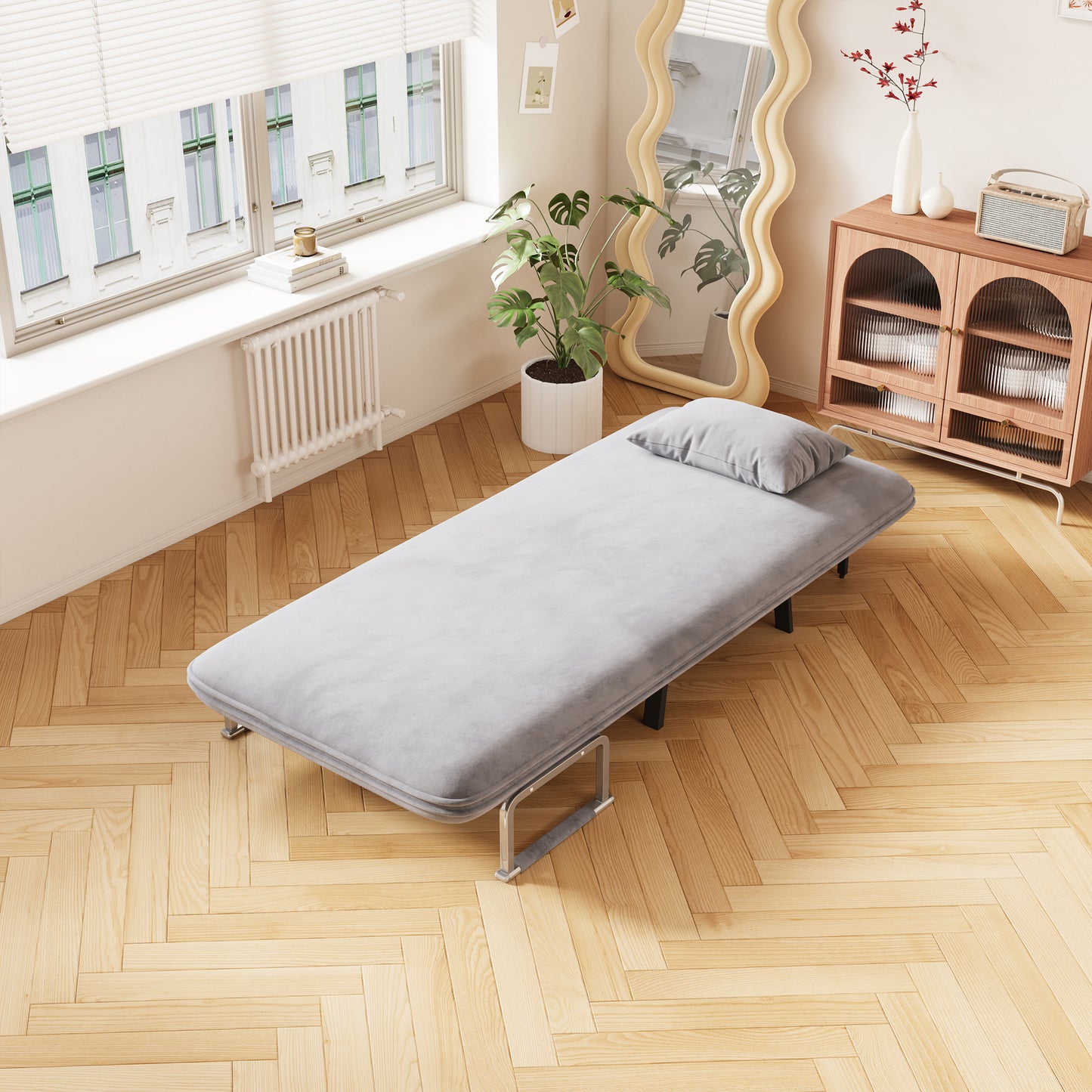Grey velvet folding bed with a plush pillow perfect for guest rooms
