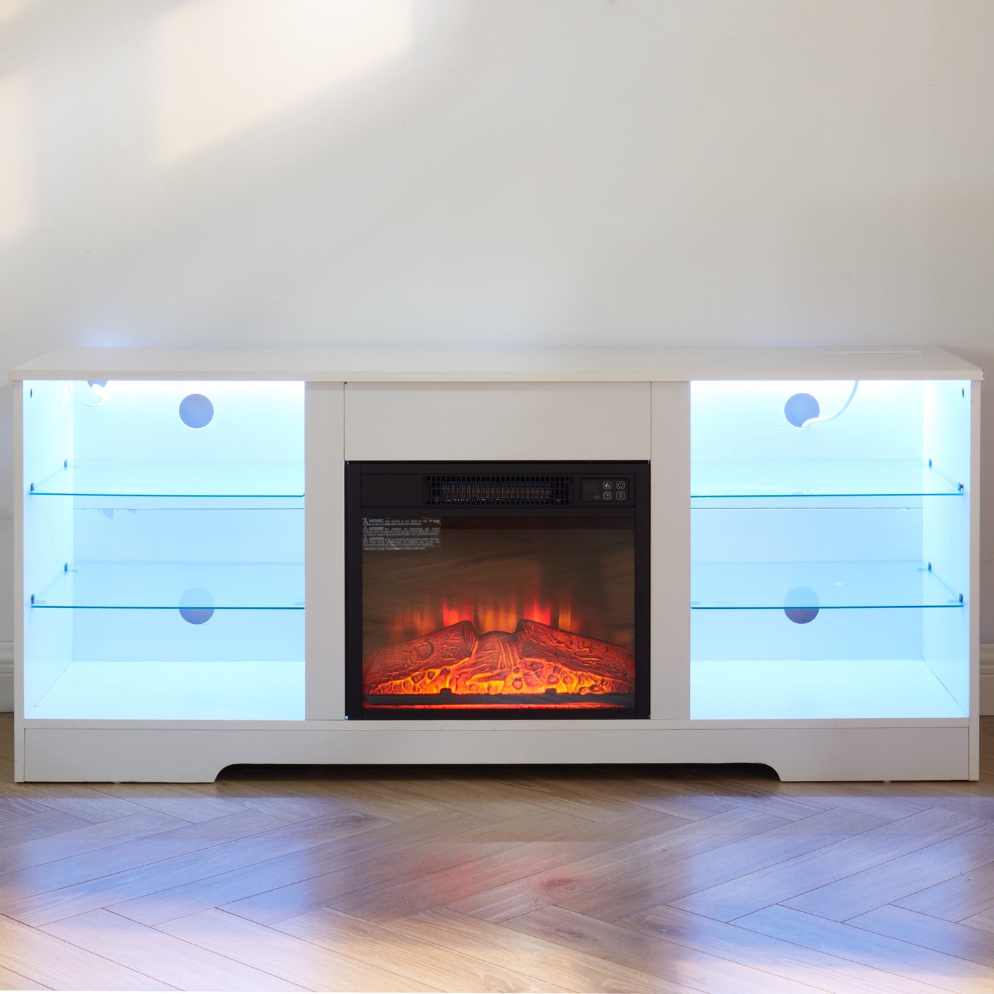 White media console with builtin electric fireplace and blue LED lighting