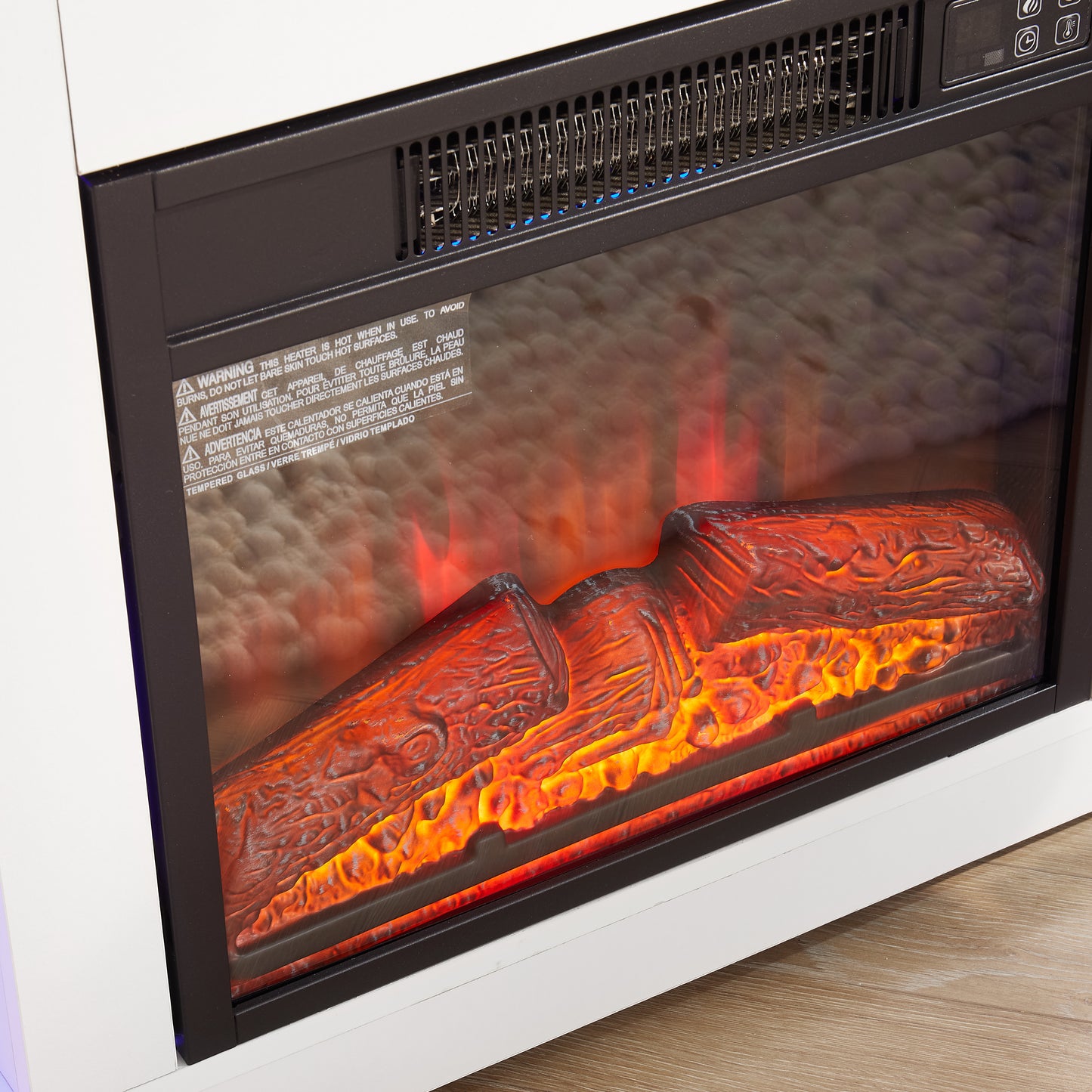 Realistic electric fireplace logs with glowing orange and red flames for a cozy ambiance