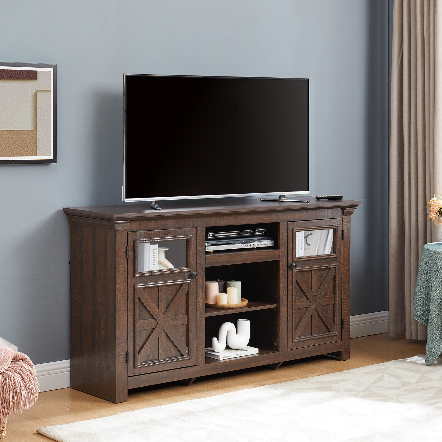 Dark brown farmhouse TV stand with barn door style cabinets and glass inserts