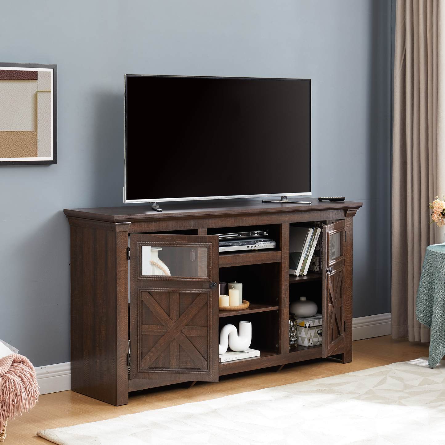 Dark wood TV stand with glasspaned cabinet doors and open shelving for media consoles