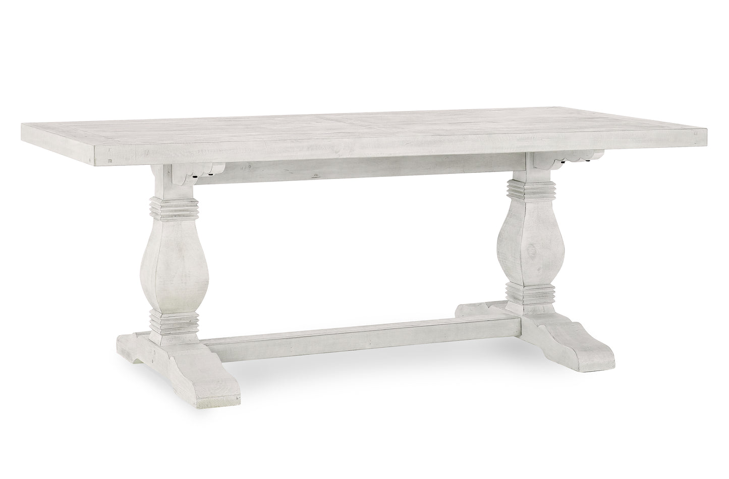 Distressed white wooden dining table with trestle base perfect for farmhouse kitchens