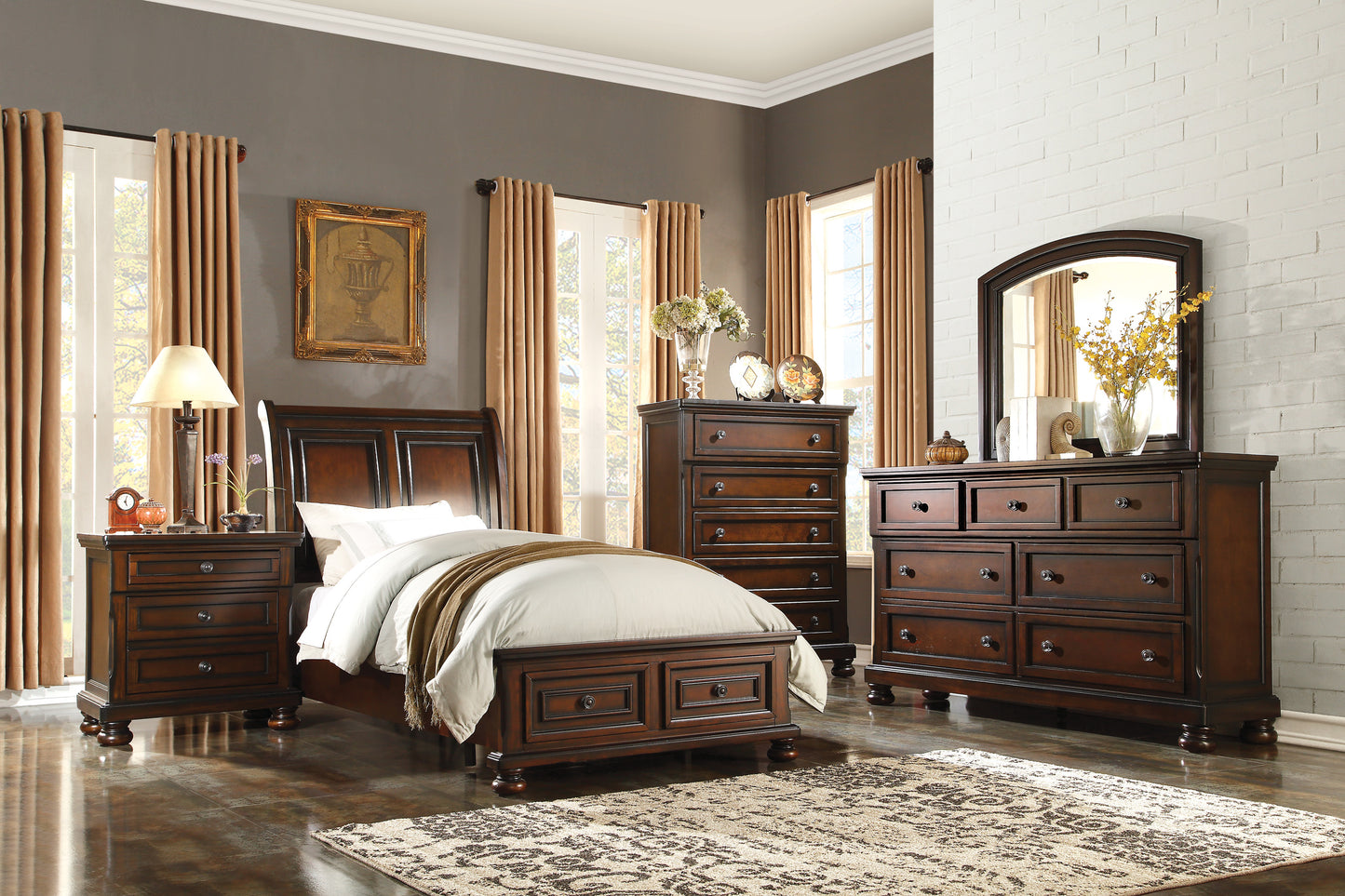 Classic sleigh bed with dark wood finish and detailed carvings creating a luxurious bedroom set