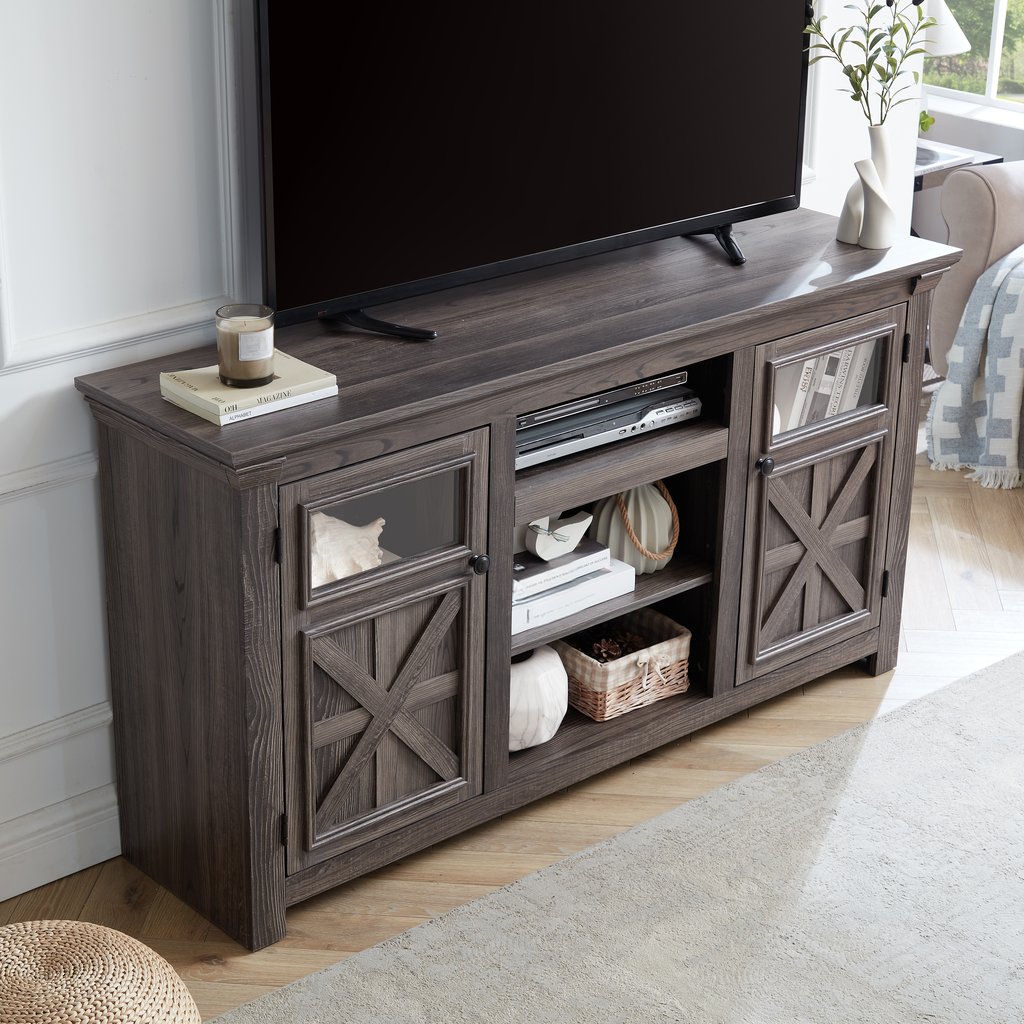 Rustic gray wood TV stand with glasspaneled doors and Xdesign detailing holds electronics