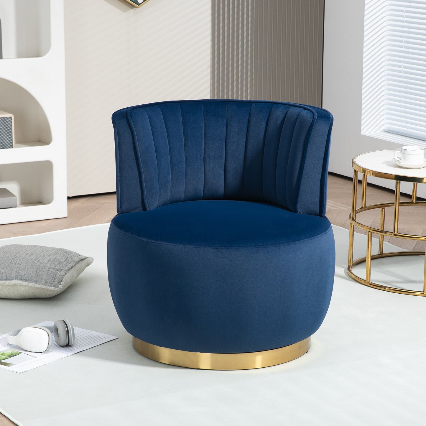 Deep blue velvet accent chair with gold base ideal for modern living rooms