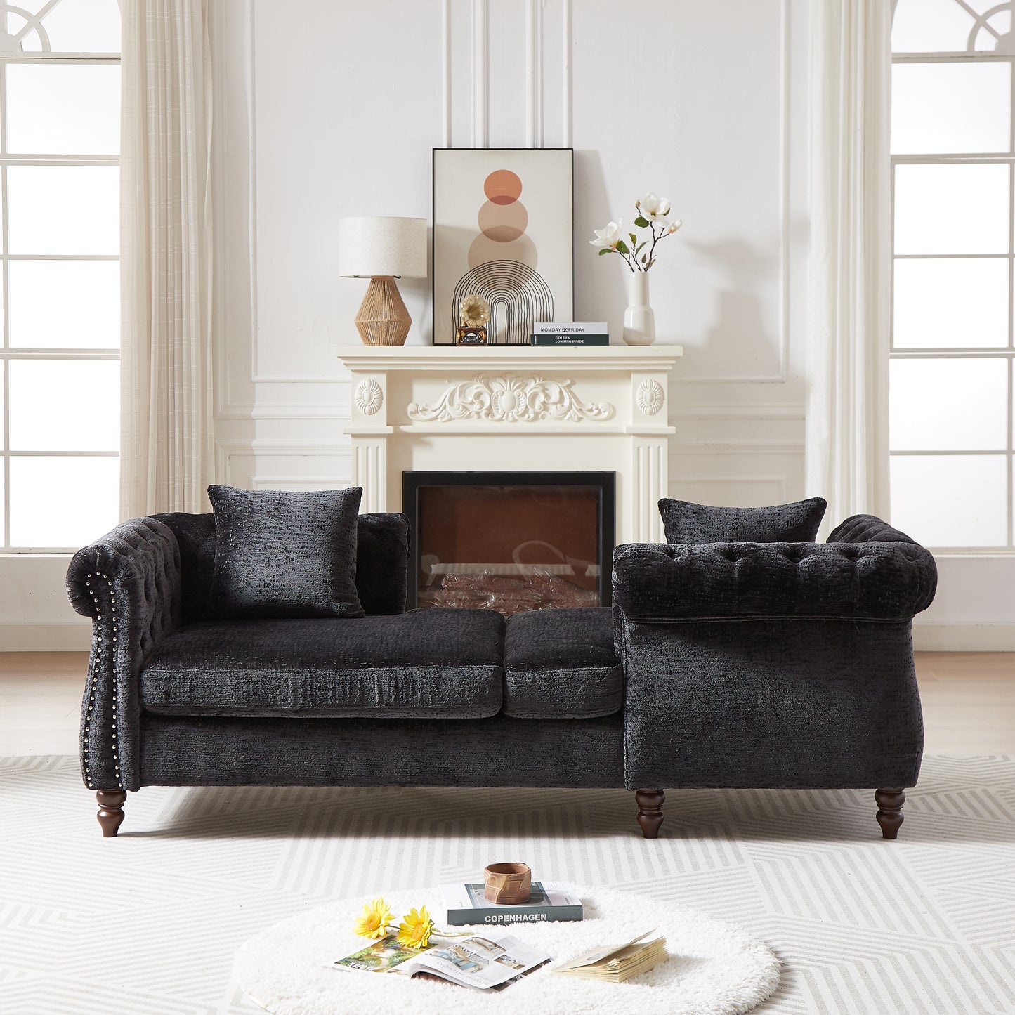 Dark charcoal velvet chesterfield sofa with button tufting and nailhead trim detail