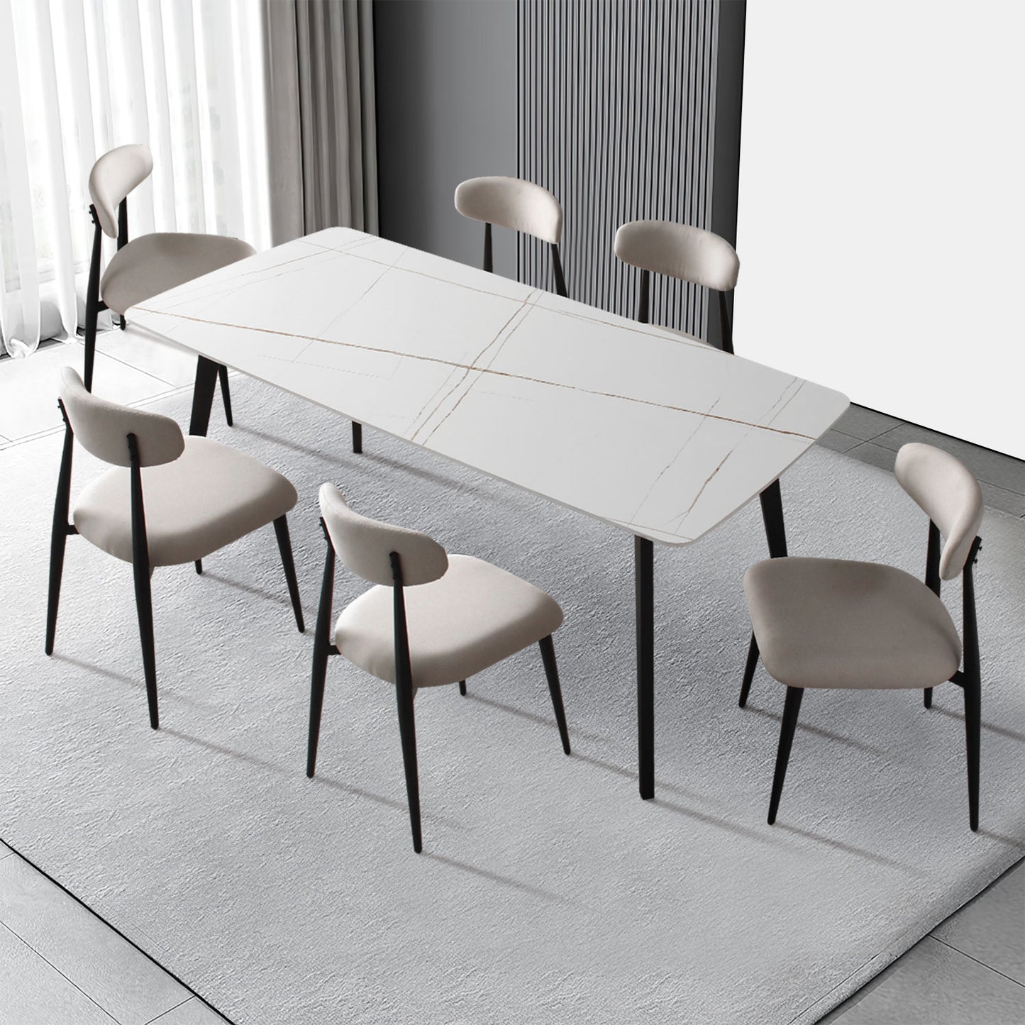 Modern white ceramic dining table with gold veining and grey upholstered chairs