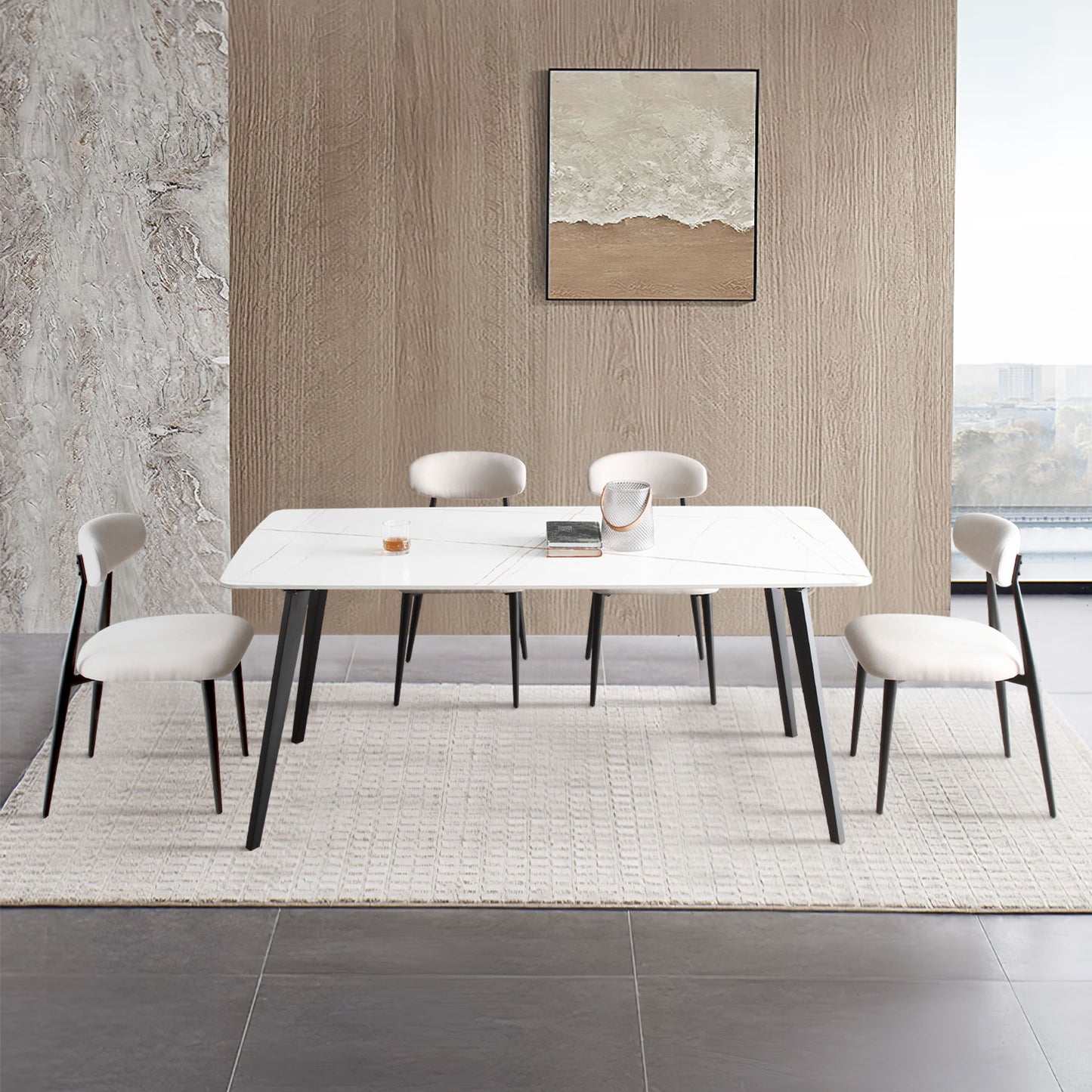 Modern white dining table with four beige upholstered chairs and black legs