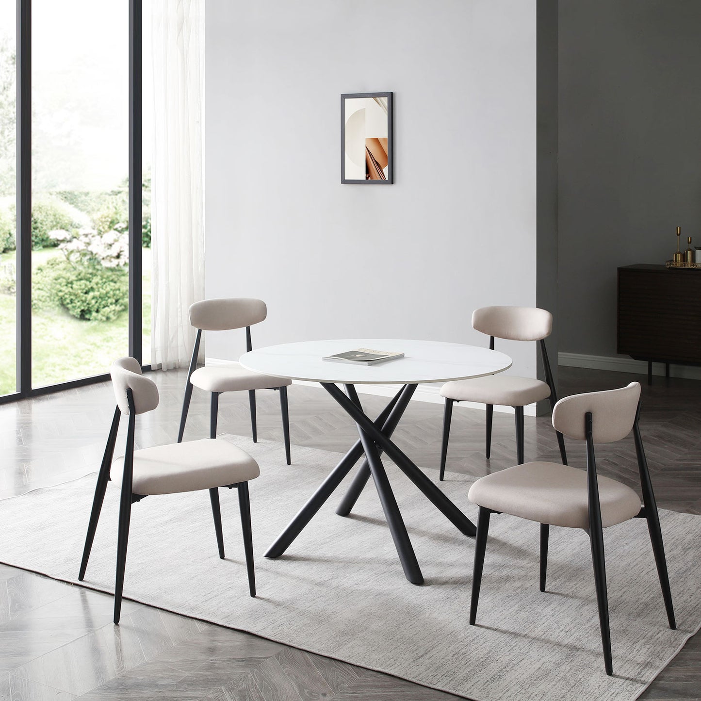 Modern dining set white round marble top table with black pedestal base and four beige upholstered chairs