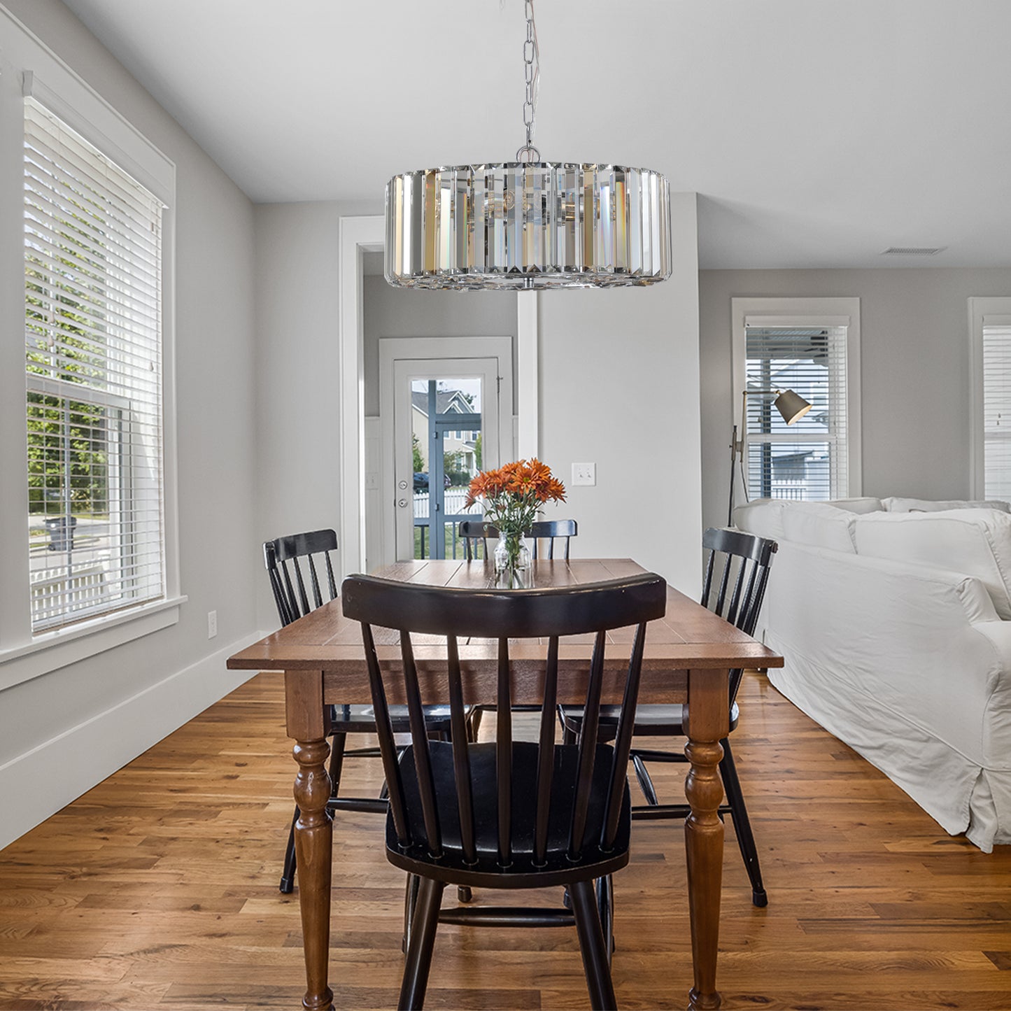 Modern crystal chandelier with chrome finish providing elegant lighting for dining rooms