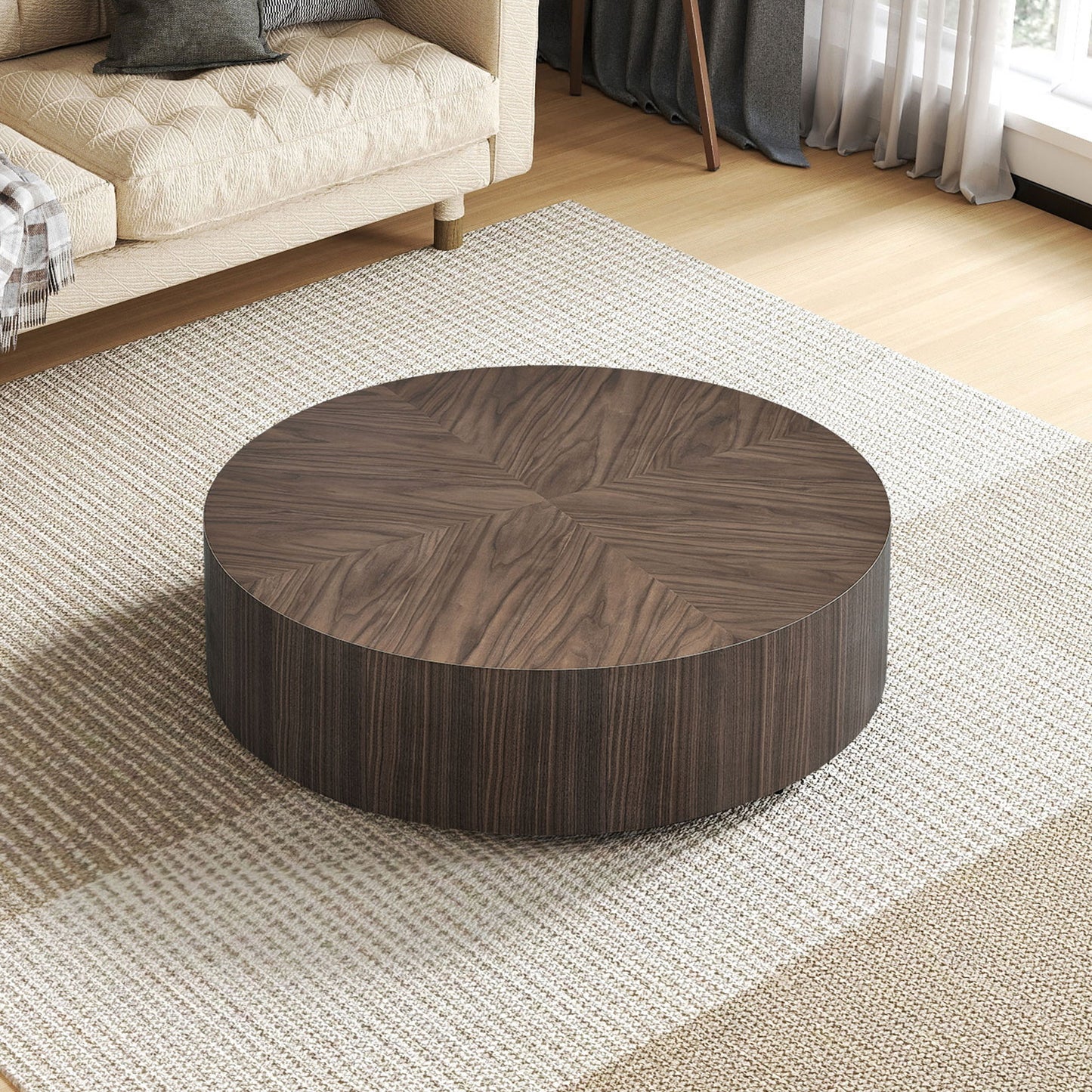 Round wooden coffee table with geometric veneer pattern and dark wood finish