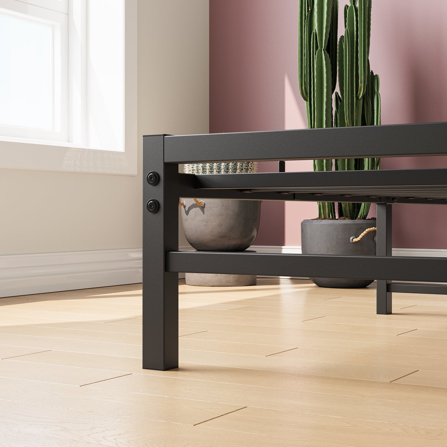 Black metal bed frame detail with modern minimalist design