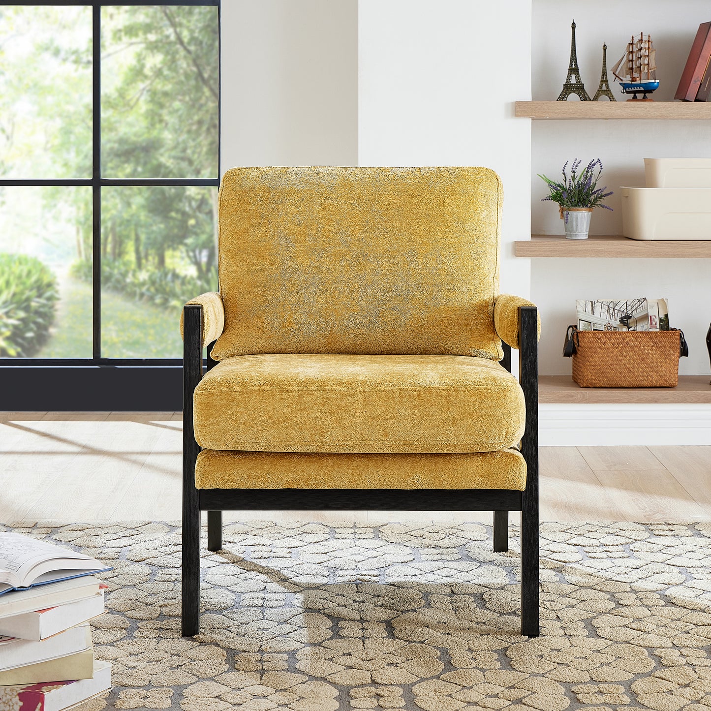 Textured mustard yellow armchair with black metal frame perfect for a cozy reading nook