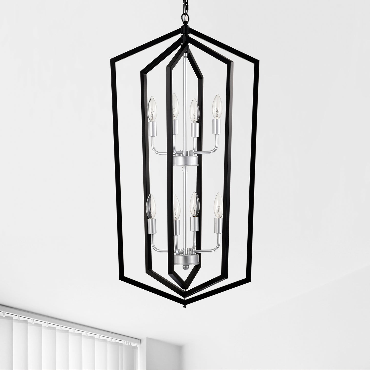 Geometric black metal lantern chandelier with silver accents and six candelabra bulbs