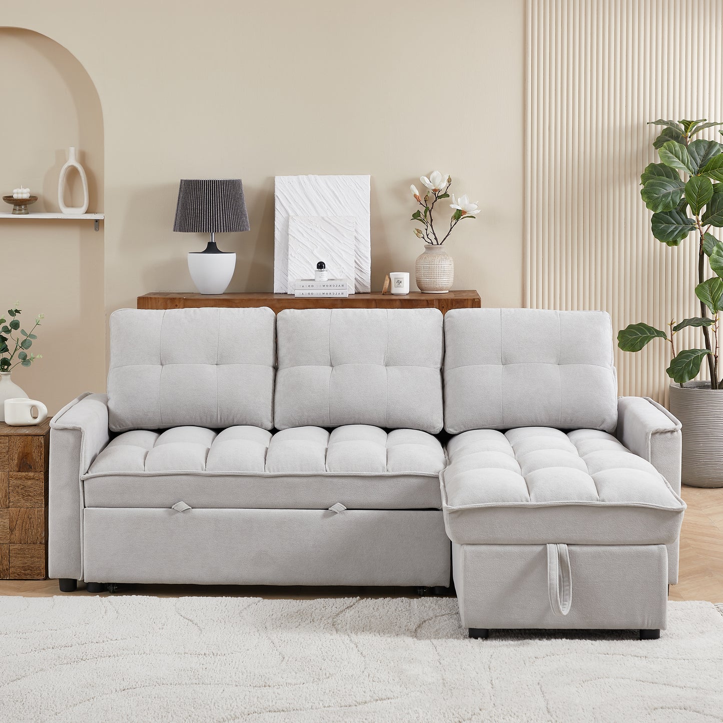 Light gray tufted sectional sofa with storage chaise ideal for modern living rooms