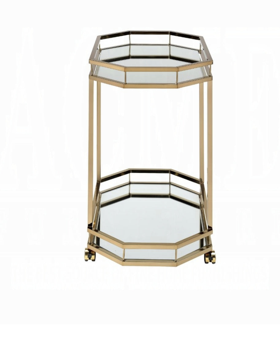 Glamorous brass bar cart with two mirrored octagonal shelves and wheels
