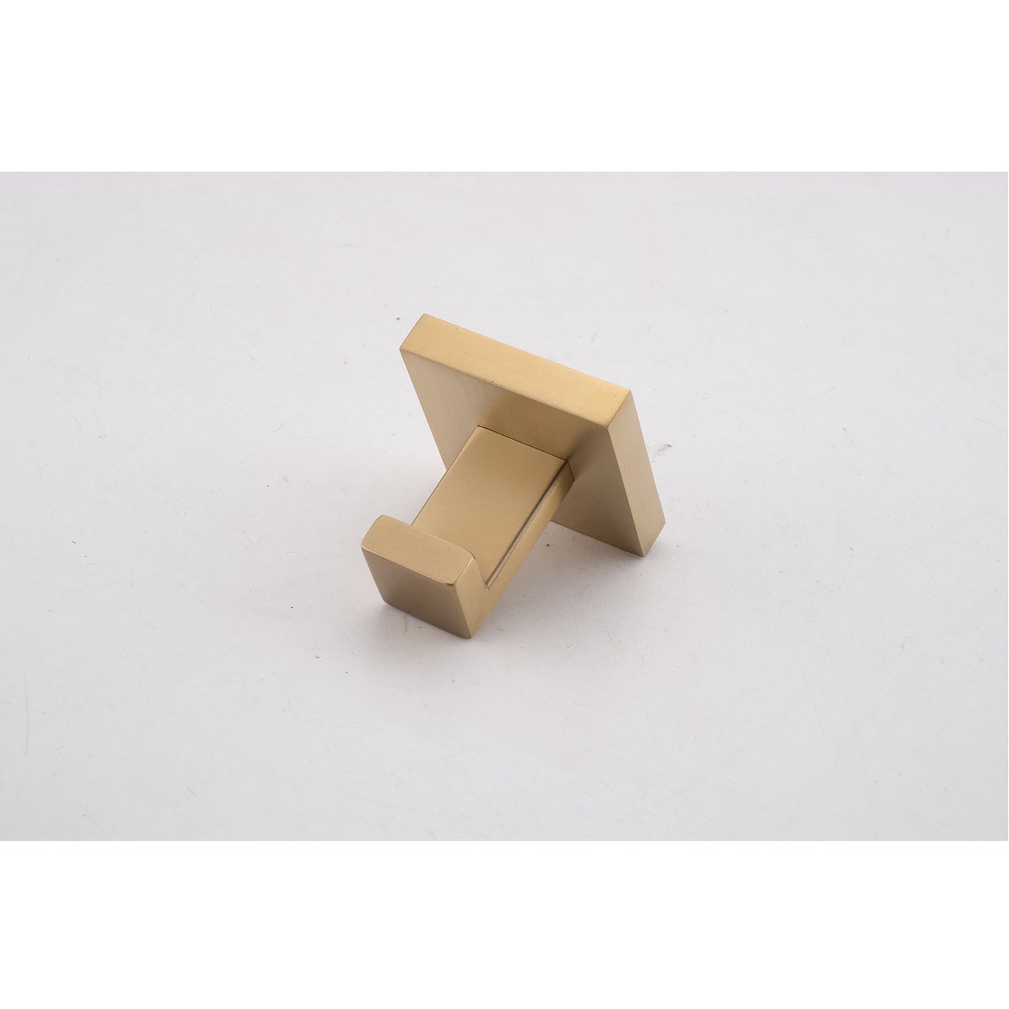 Brushed brass modern square robe hook mounted on a white background