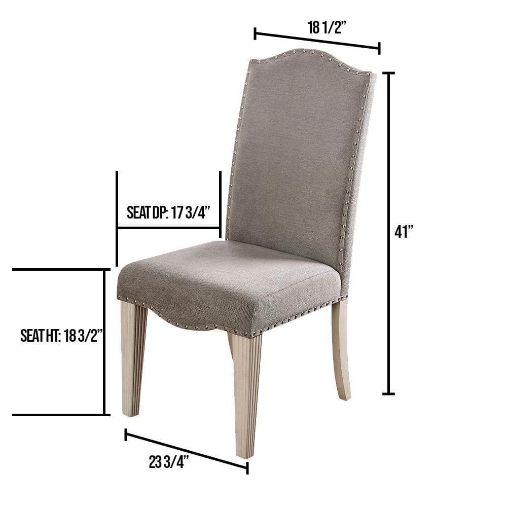 Tufted grey upholstered dining chair with nailhead trim and light wood legs