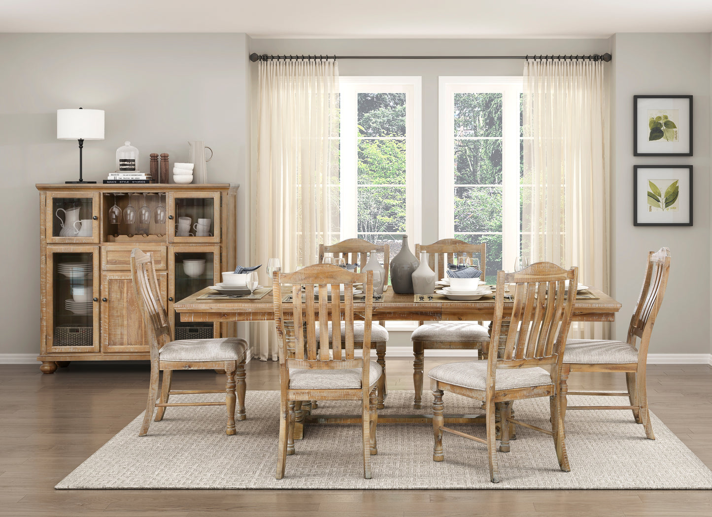 Rustic distressed oak dining table with six wooden chairs and place settings