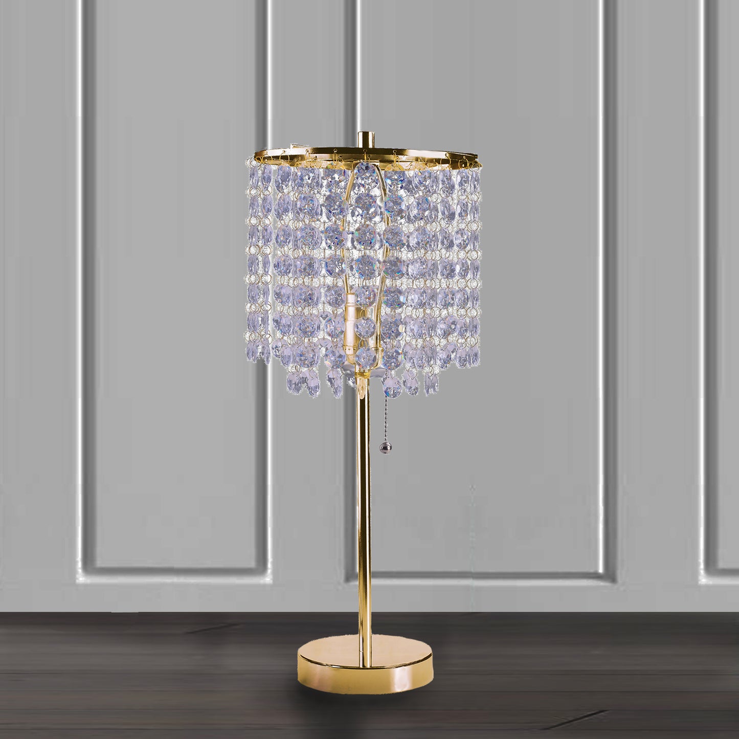 Glamorous gold table lamp with cascading clear crystal accents and a pull chain