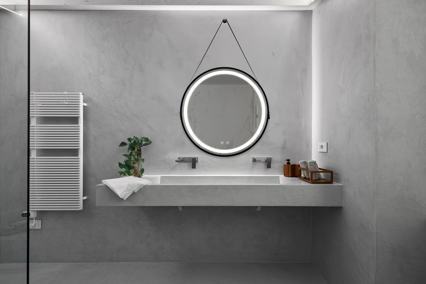 Modern round bathroom mirror with integrated LED lighting and touch controls