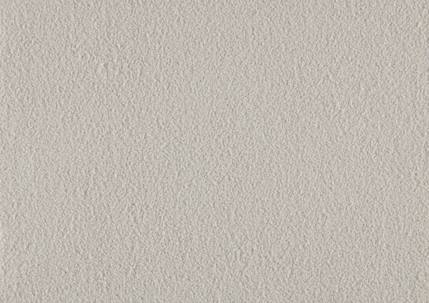Textured offwhite fleece fabric closeup ideal for cozy apparel