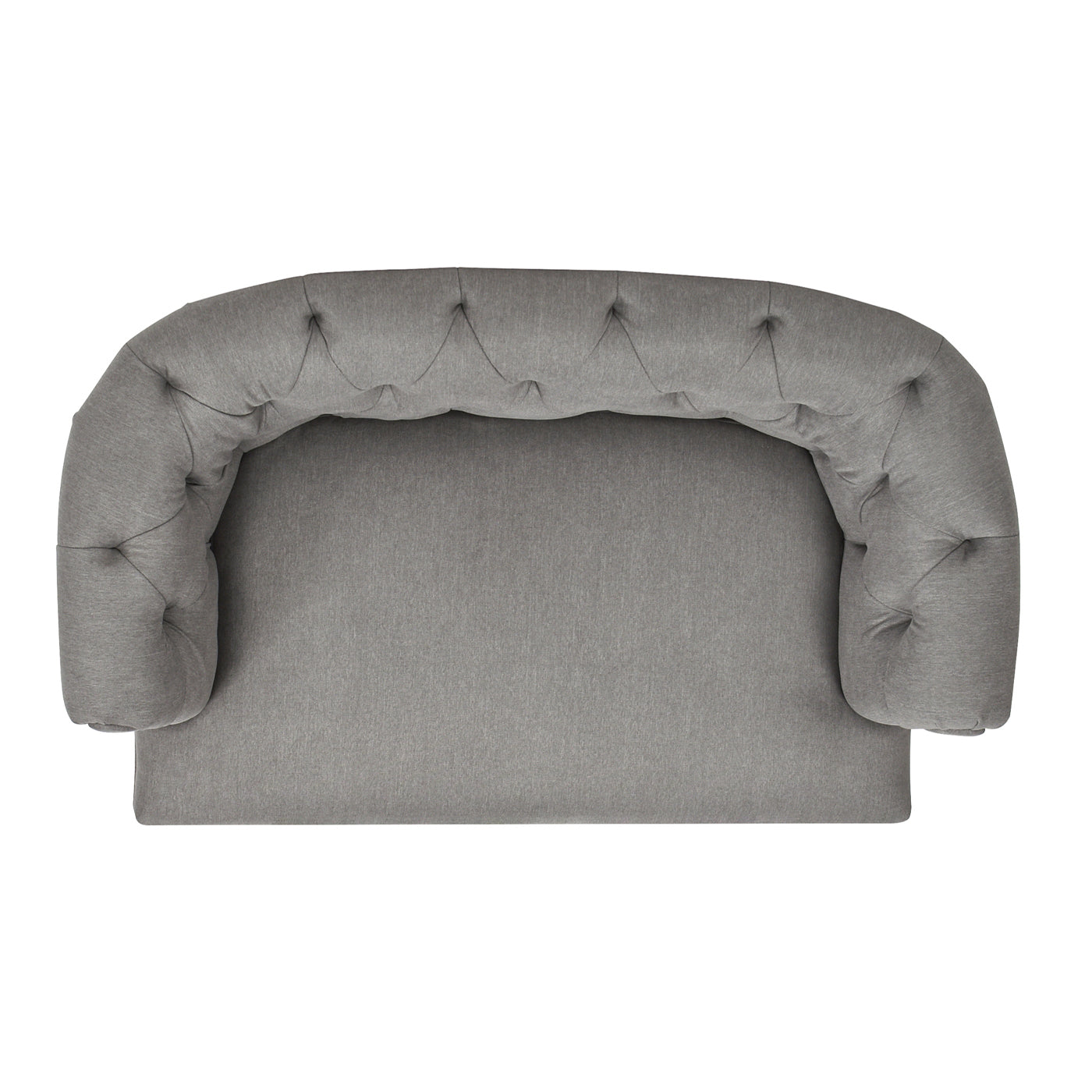 Grey tufted armchair with rounded arms and plush fabric upholstery