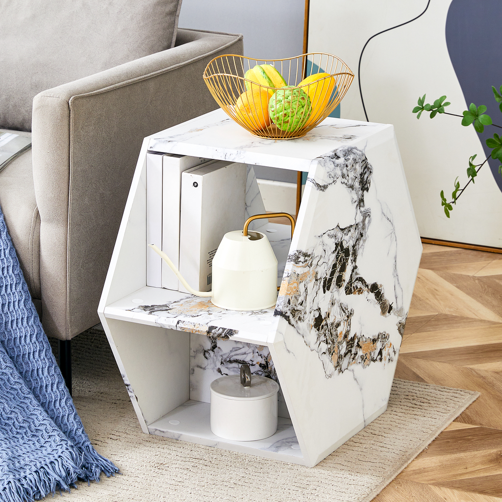Geometric marble side table with brass accents and gold fruit bowl