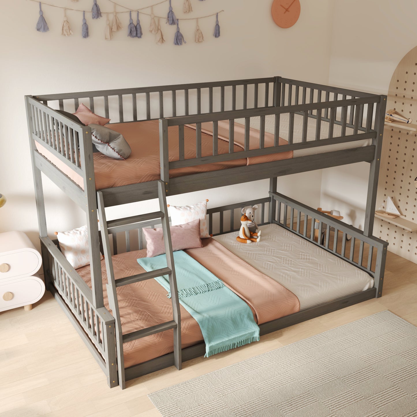 Gray twinovertwin bunk bed with wooden slats and safety rails