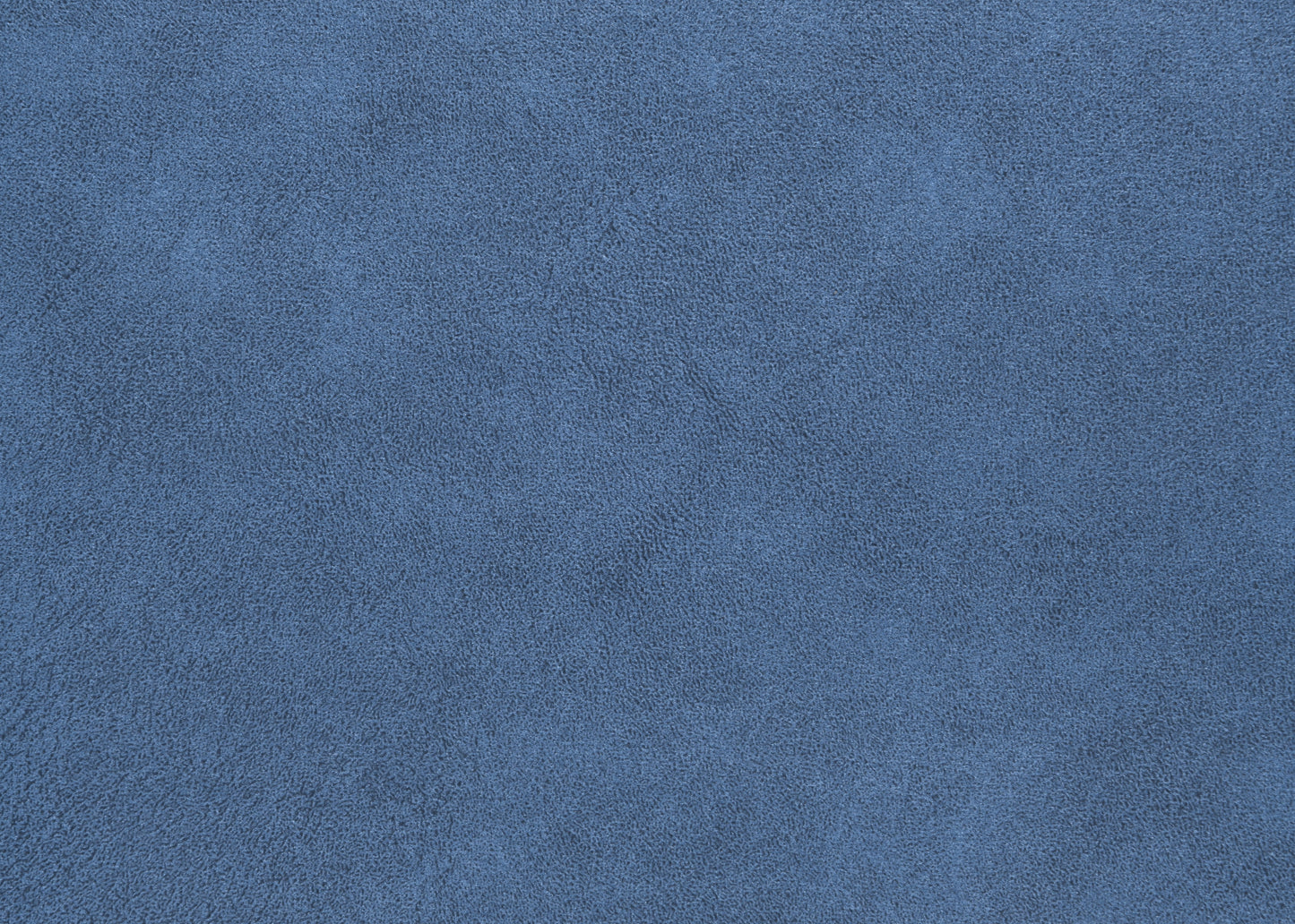 Closeup texture of dusty blue suede fabric ideal for upholstery or fashion