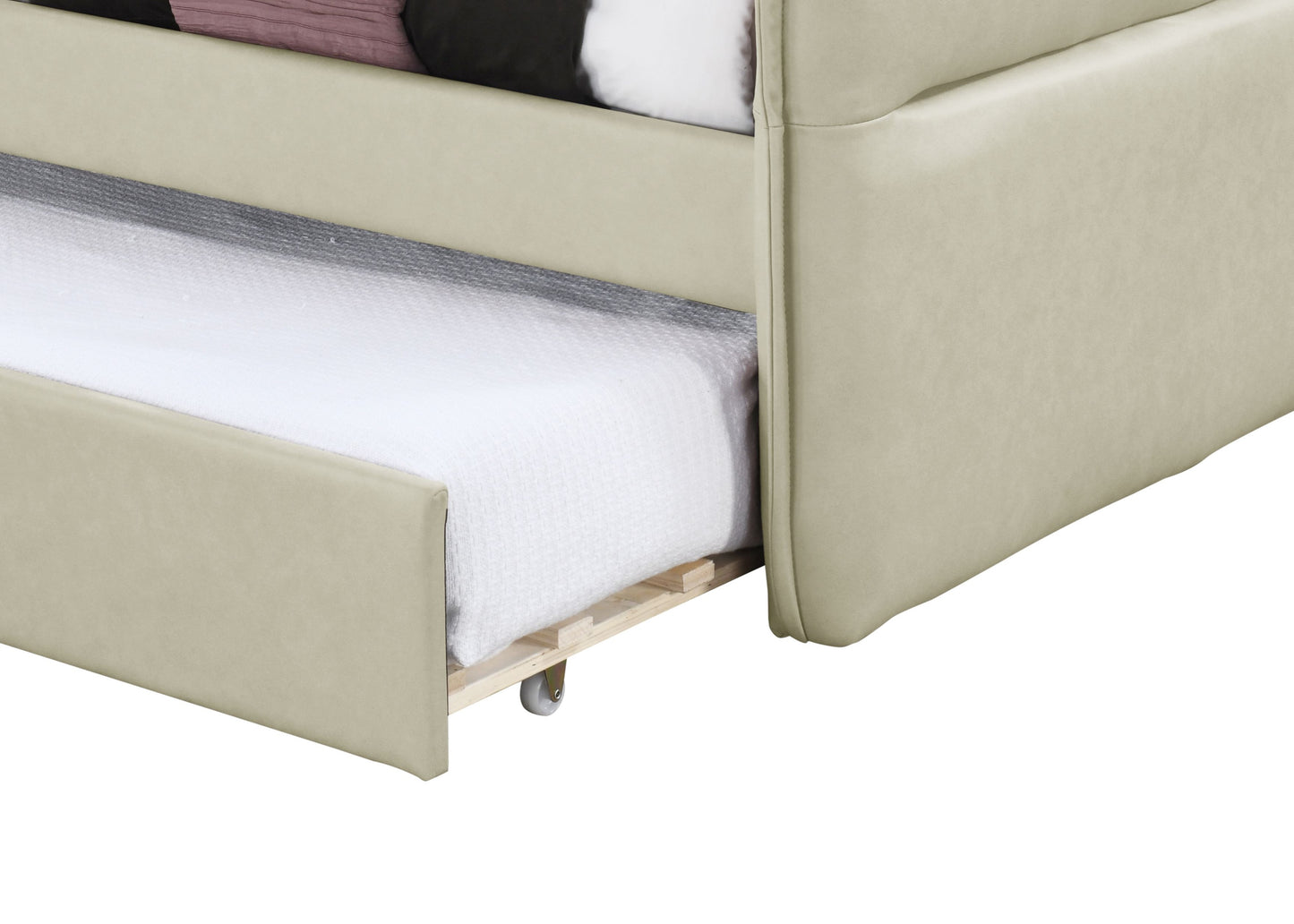 Beige upholstered daybed with a pullout trundle bed on wheels