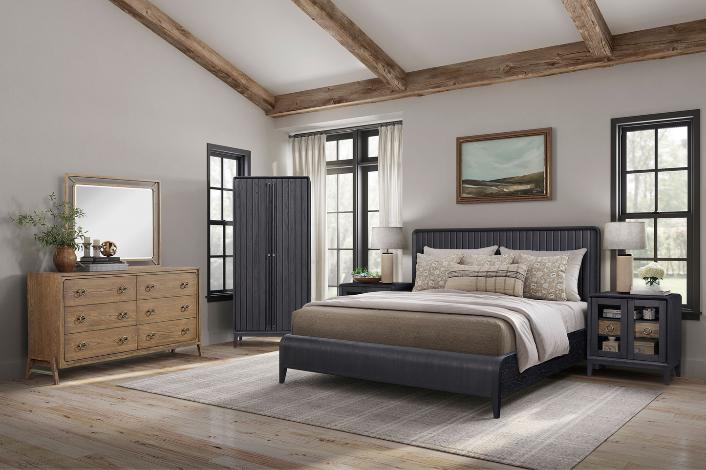 Dark grey upholstered bed with plush cushions and a rustic wood frame