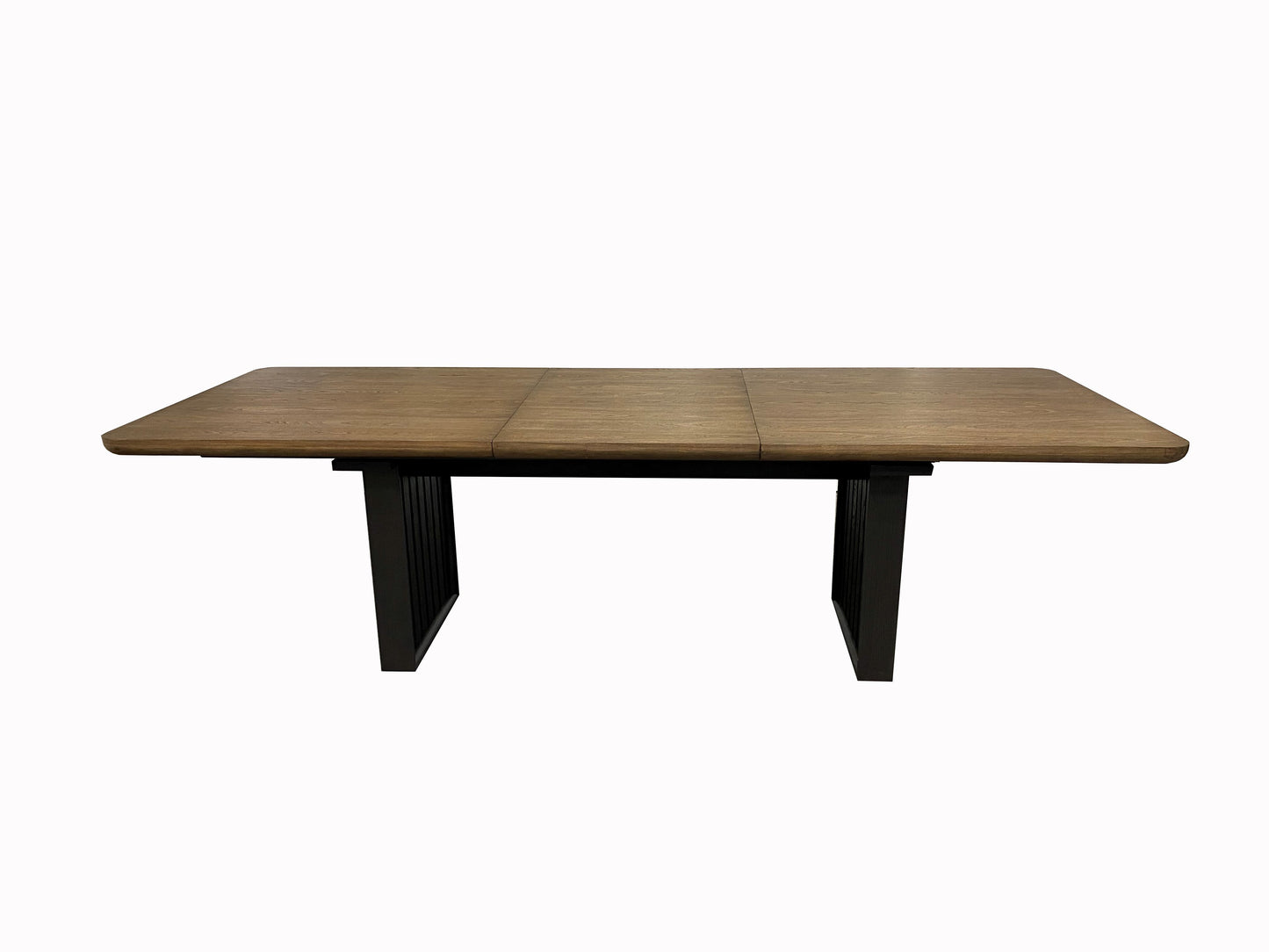 Extendable dining table with a natural oak veneer top and black metal legs