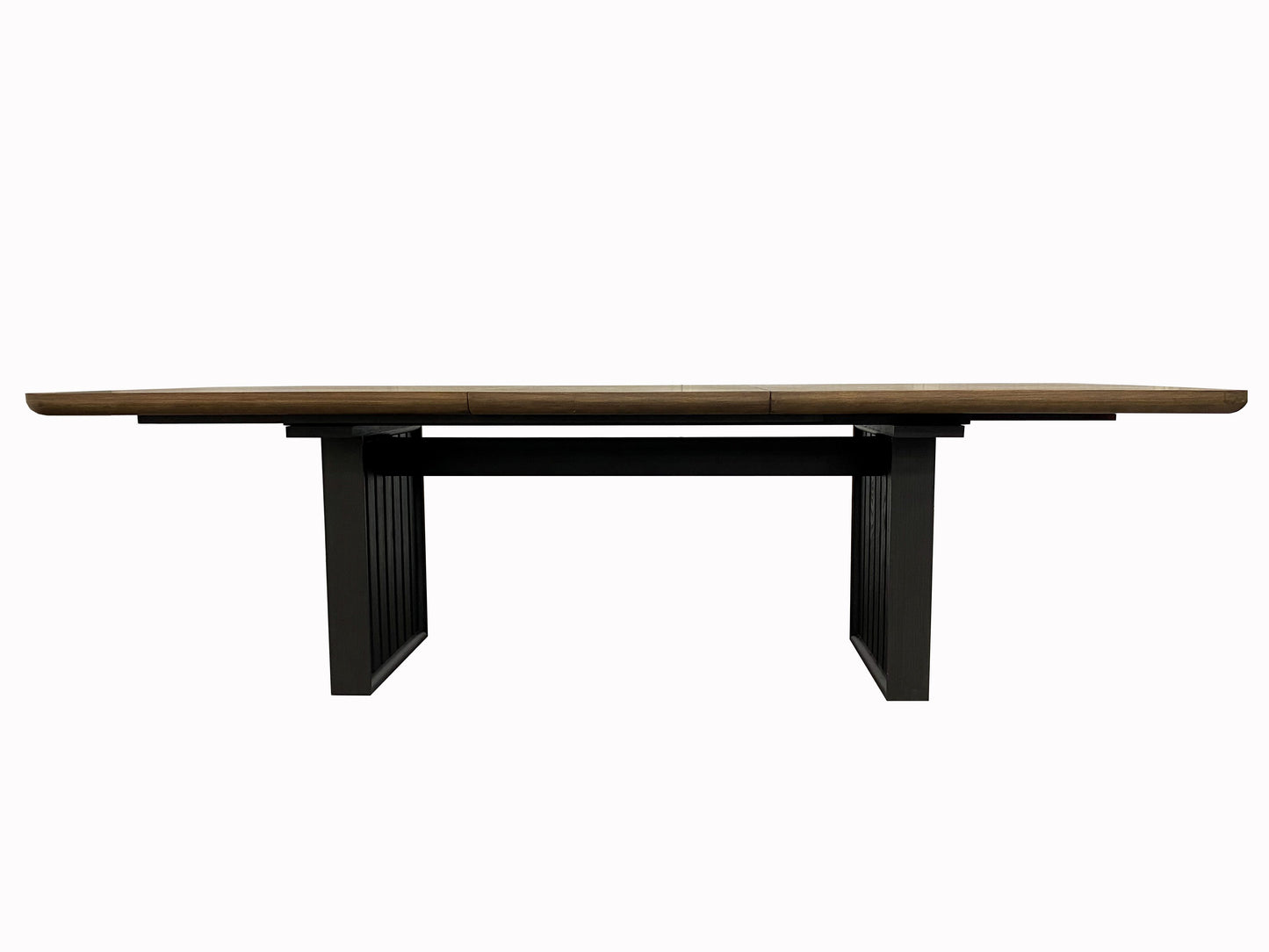 Modern extendable dining table with a rich walnut veneer top and dark metal base