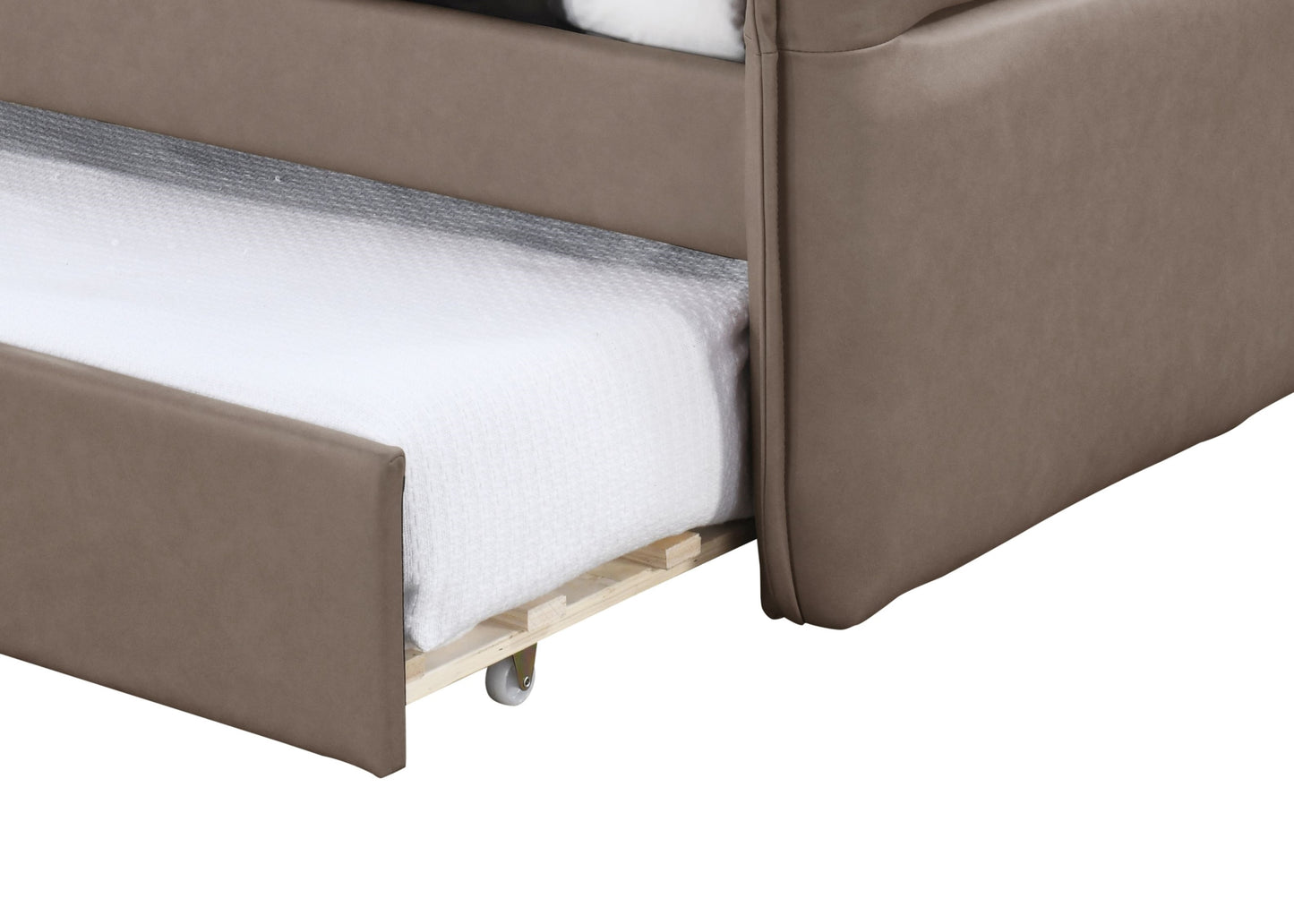 Brown faux leather couch with a pullout trundle bed perfect for guest rooms