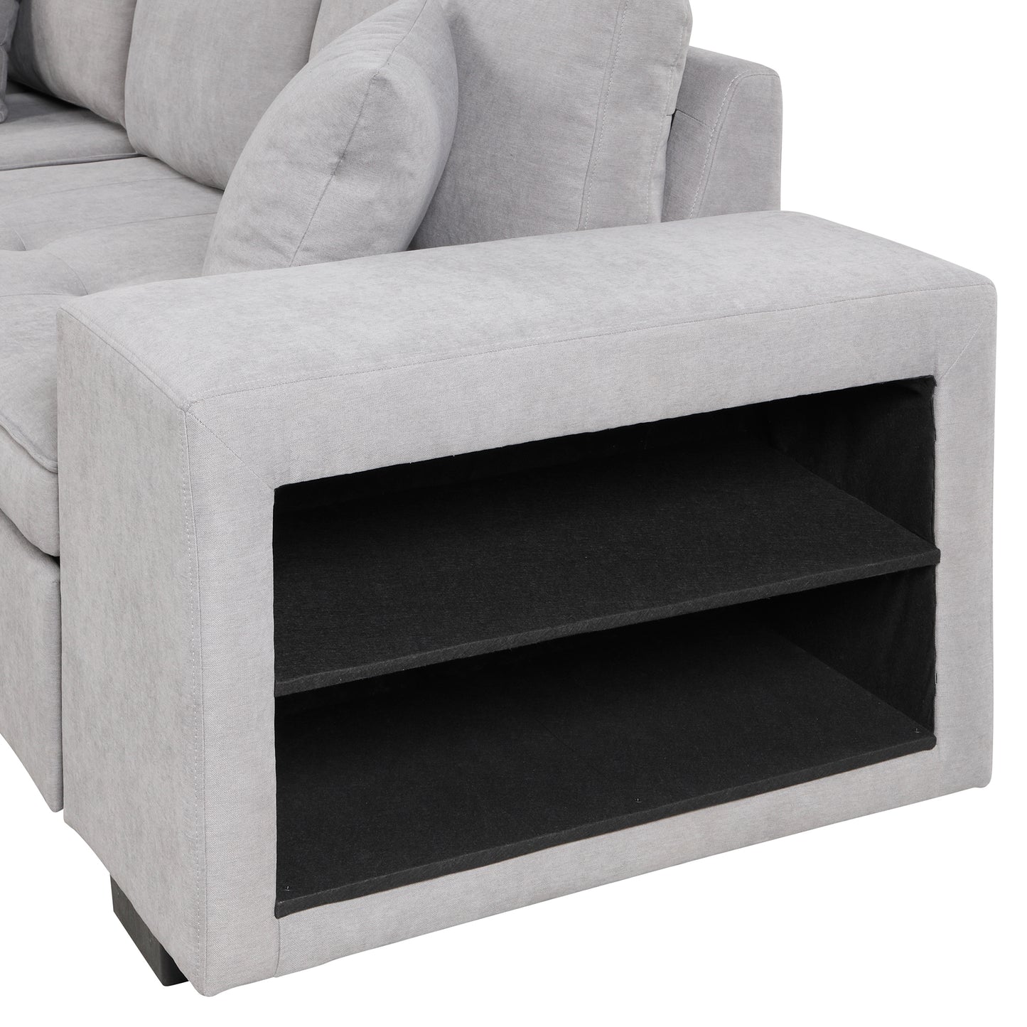 Light gray fabric sectional sofa with builtin storage shelf