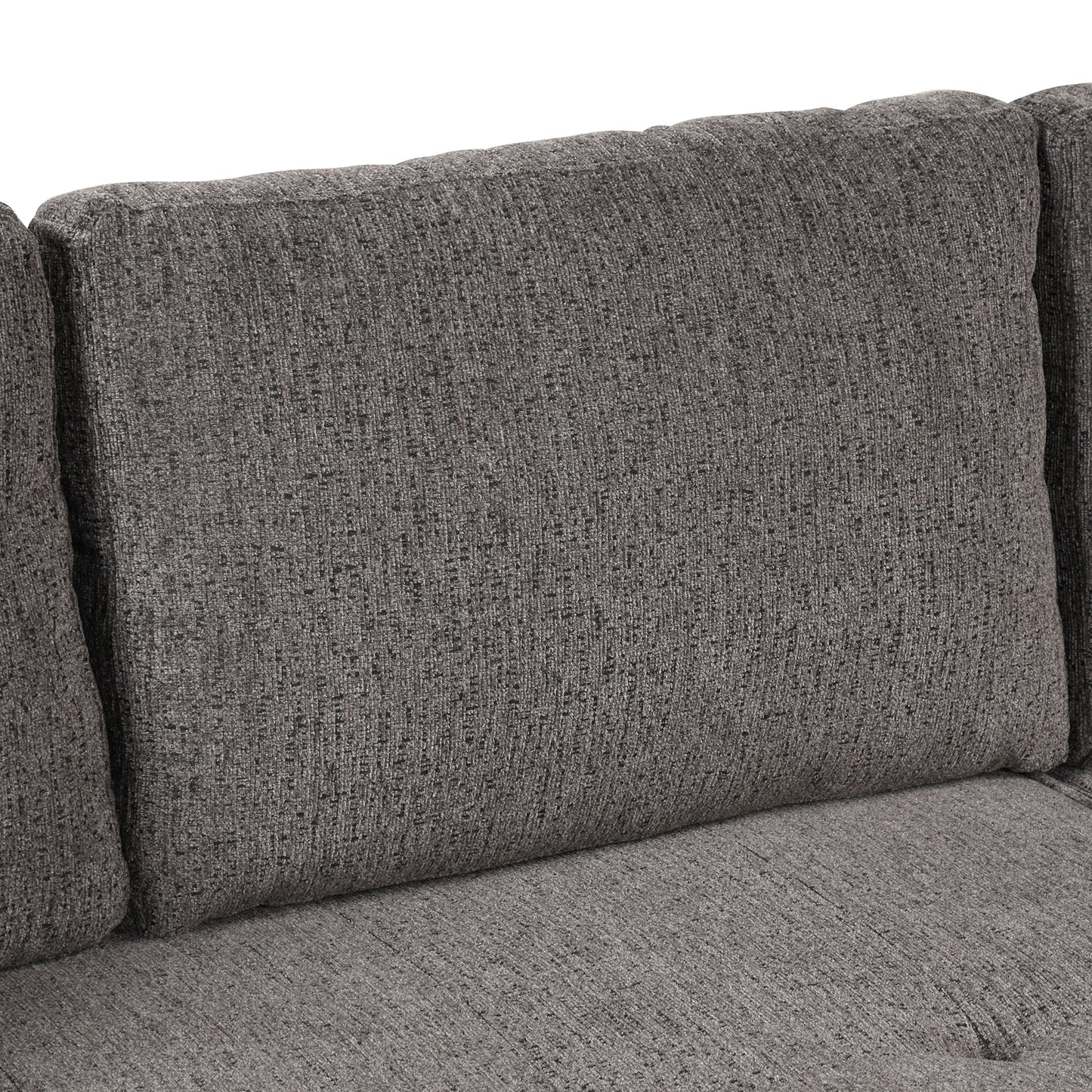 Closeup of a plush dark grey textured fabric sofa cushion