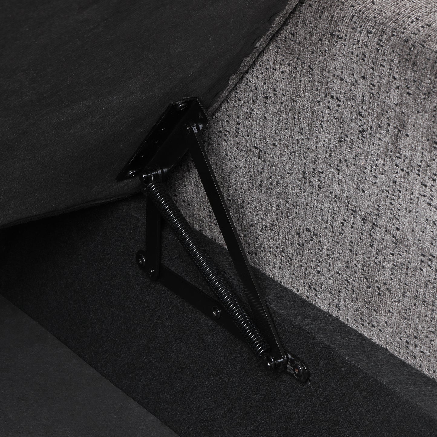Black metal lift assist mechanism with coiled spring for sofa storage