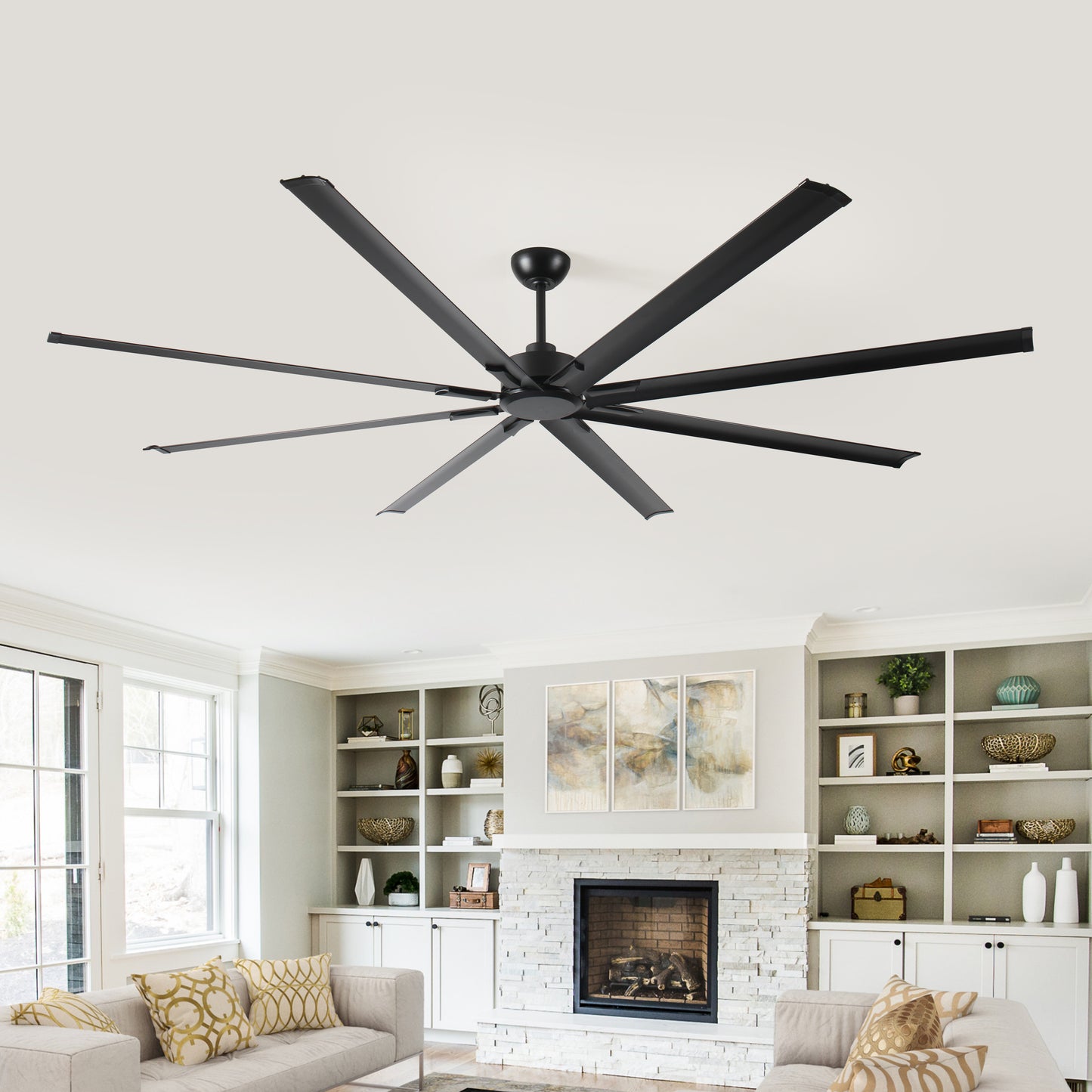 Modern black blade ceiling fan with a sleek minimalist design for large living spaces