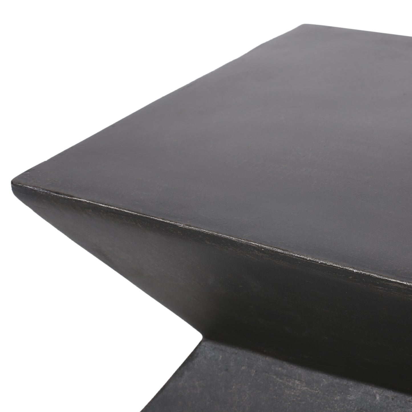 Dark grey textured metal side table with angular design