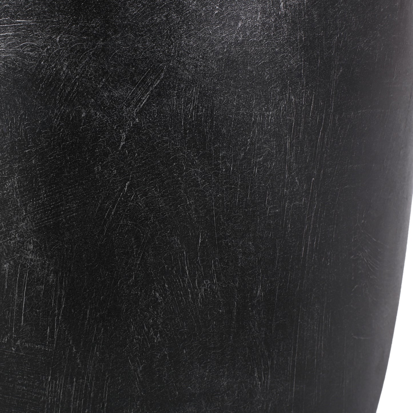 Closeup texture of a distressed black leather messenger bag