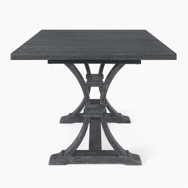 Distressed charcoal rectangular dining table with carved wooden trestle base