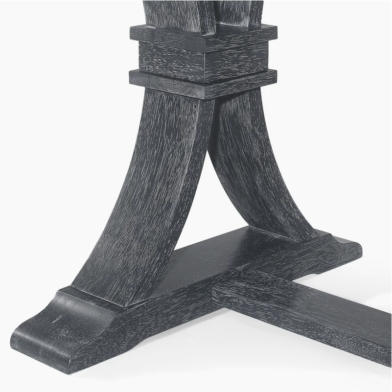 Dark wood pedestal base with distressed finish part of a dining table
