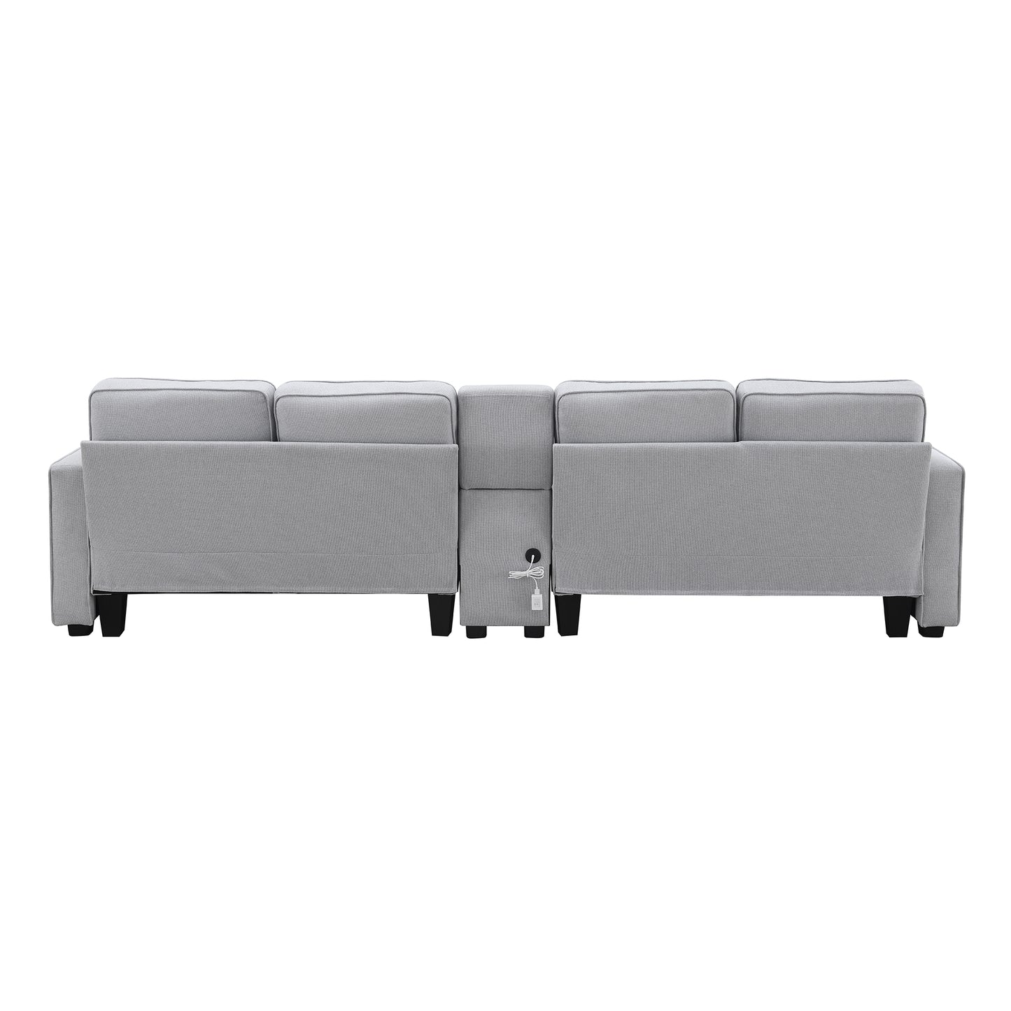 Rear view of a modern grey fabric sectional sofa with black legs featuring a central console