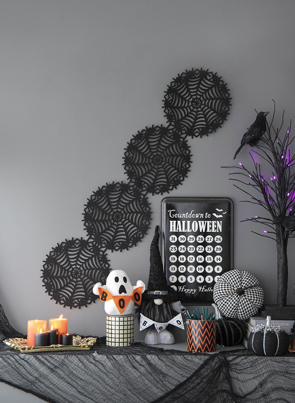 Black felt spiderweb garlands for Halloween wall decor