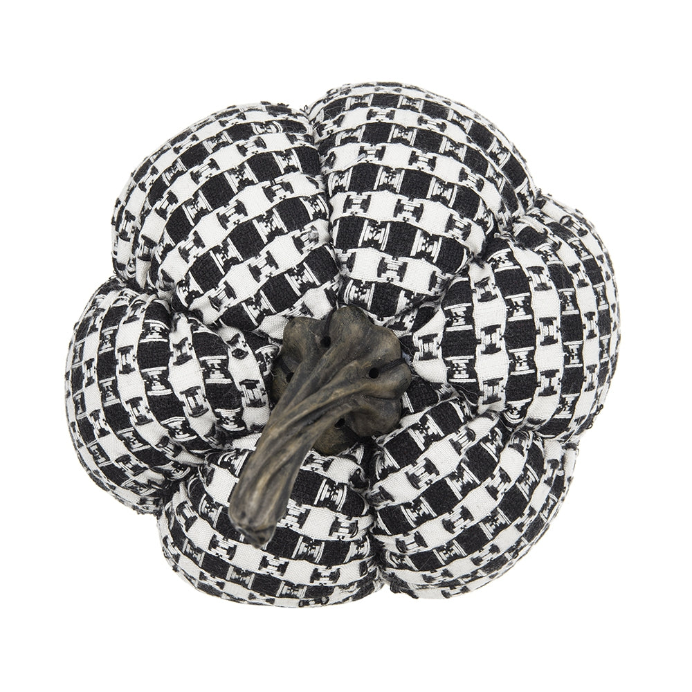 Textured fabric pumpkin in black and white checkered pattern with metal stem