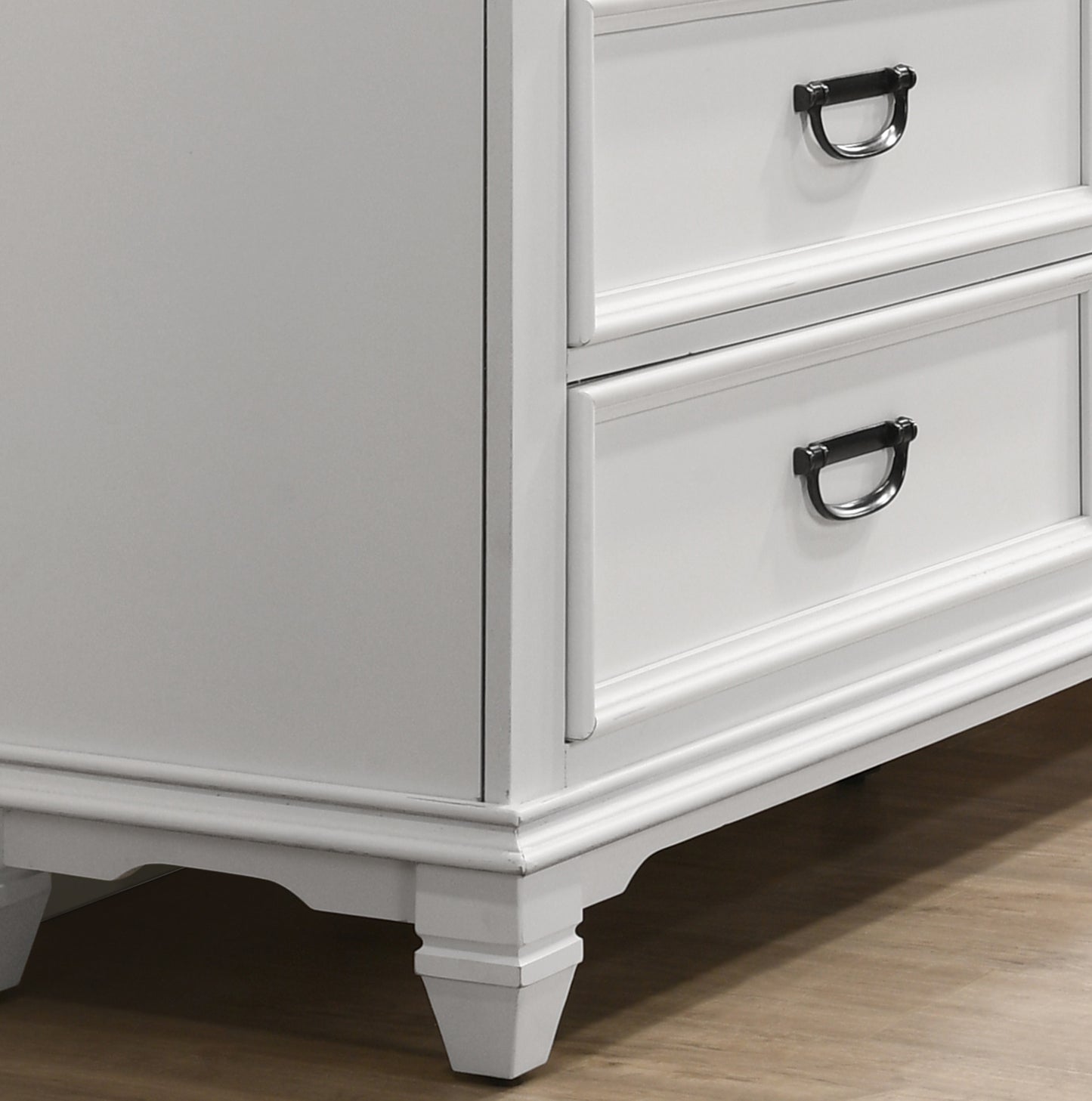 White wood dresser with black drawer pulls