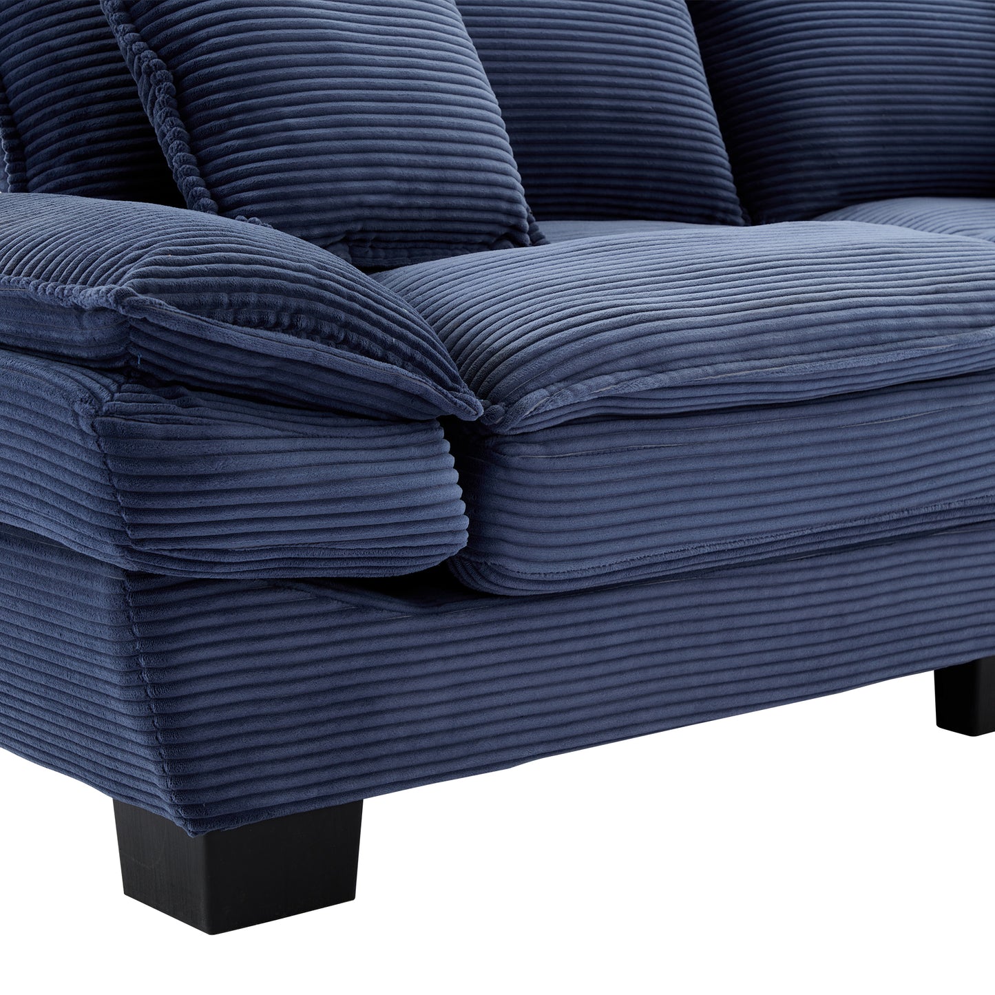 Deep navy blue corduroy sofa with plush cushions offering a cozy living room seating option