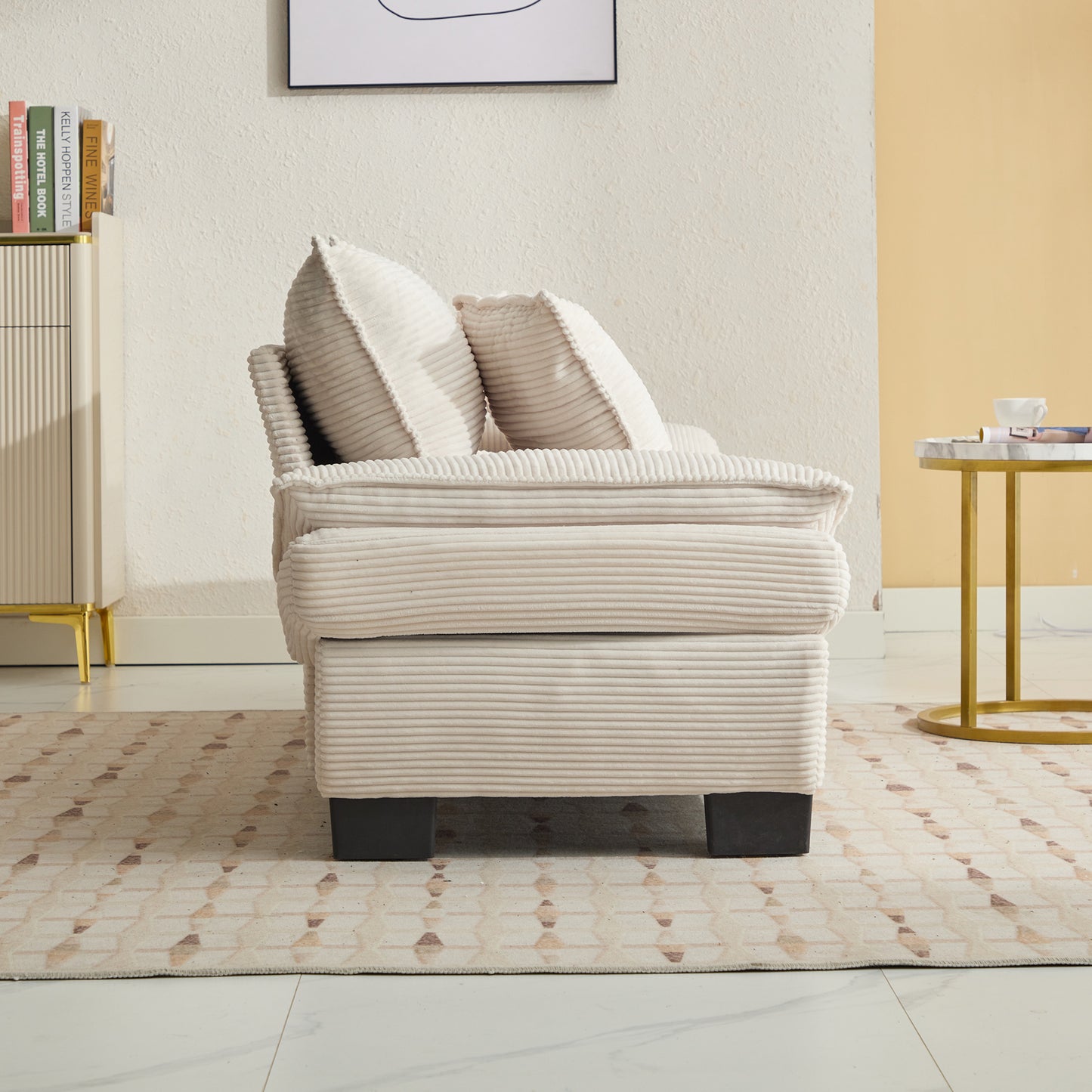 Plush cream corduroy armchair with deep seat and plush cushions for comfortable seating